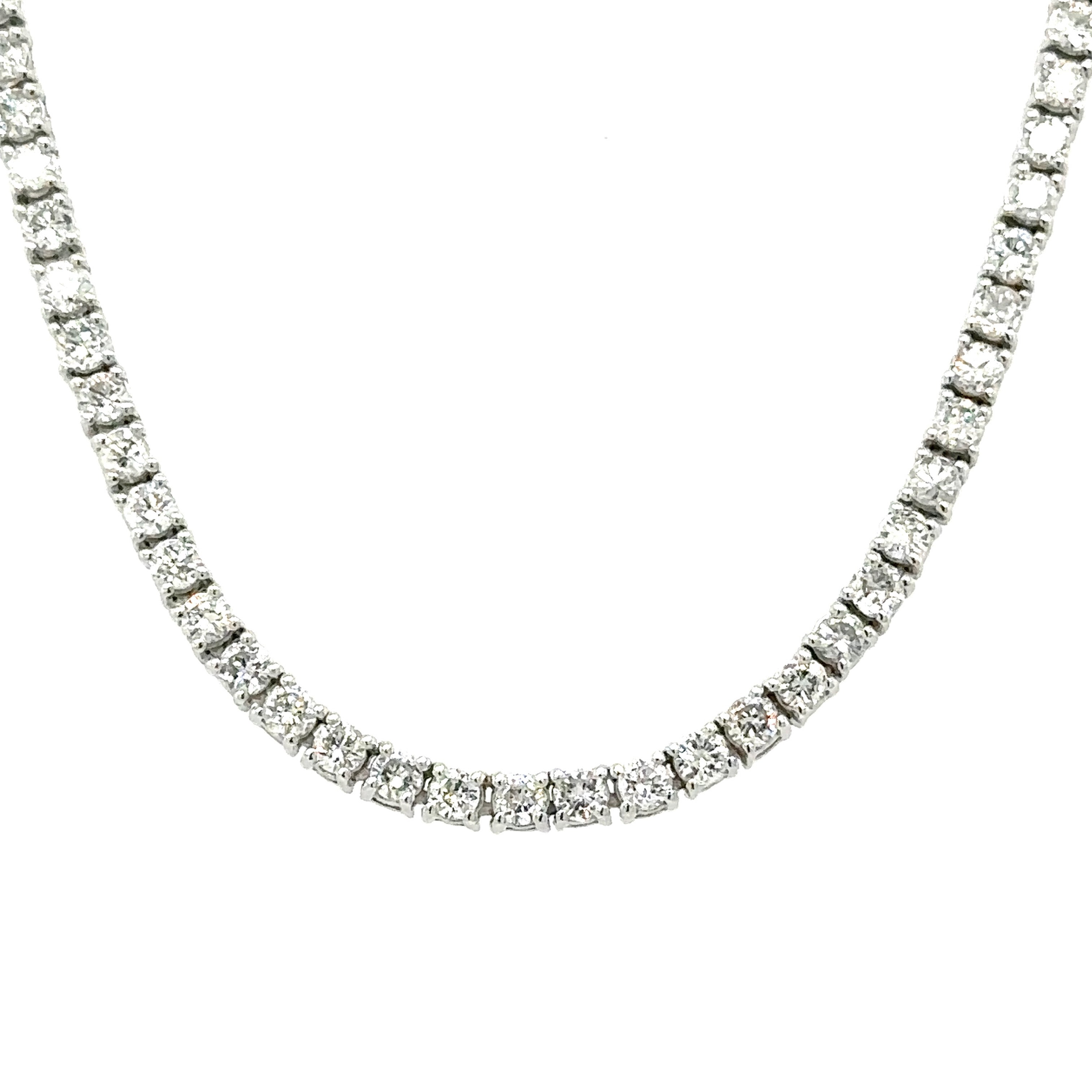 A classic diamond tennis necklace with round brilliant cut diamonds set in a 18K white gold chain.