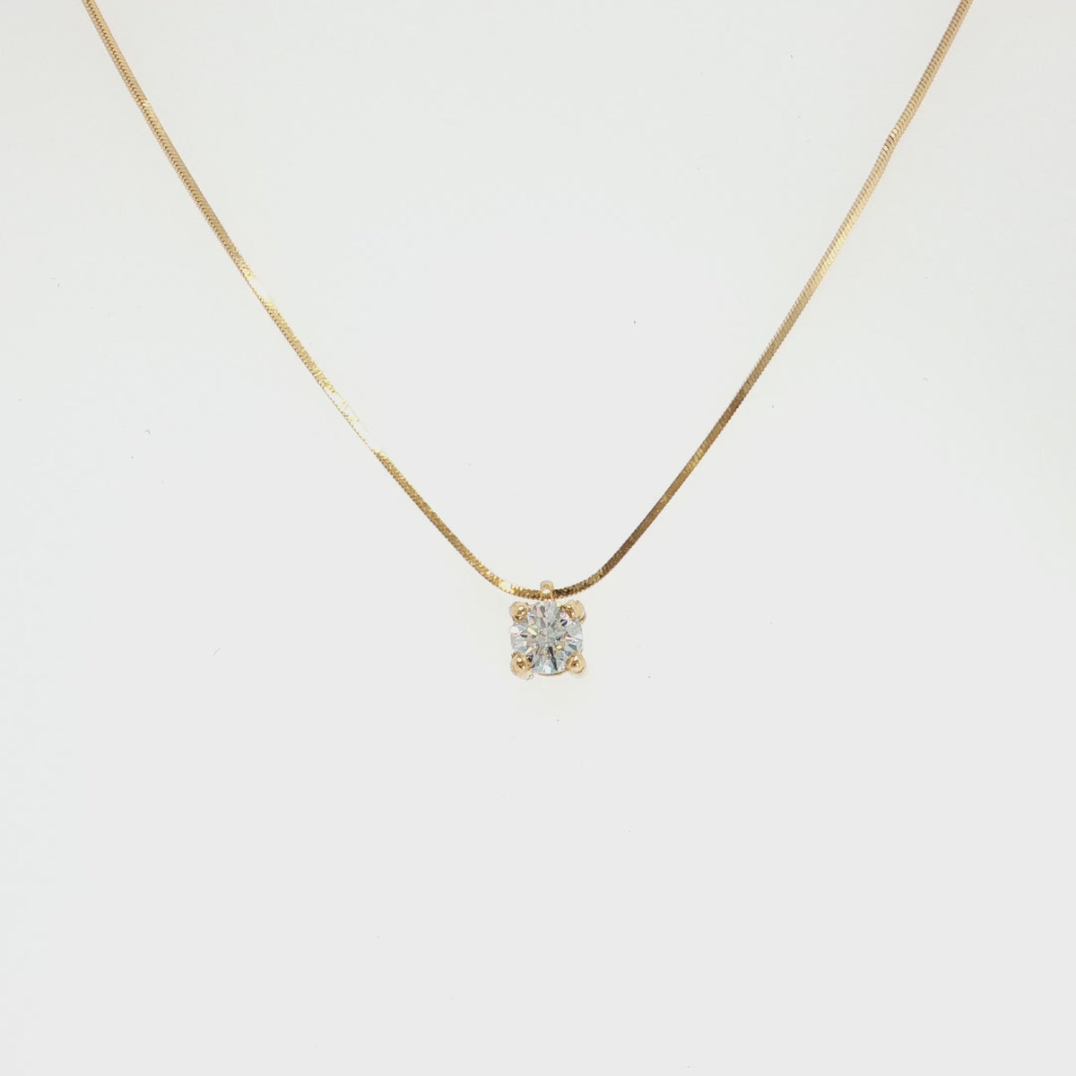 Mae 0.30 ct GIA graded F VS1 natural diamond solitaire necklace in 18k yellow gold with a box chain – video
