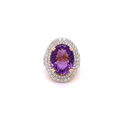 Oval cut amethyst and diamond cocktail dress ring